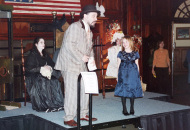 Trunke show with red-haired young girl